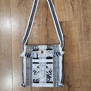 Shoulder bag with a slanted strap